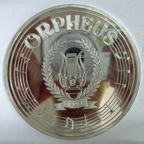 Krewe of Orpheus throws: fedoras, footballs and musical instruments galore